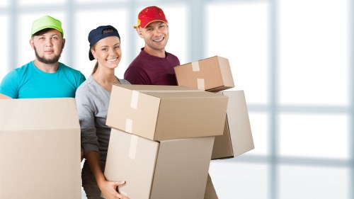 Furniture storage collection for a Highbury home with bulky items being carefully prepared
