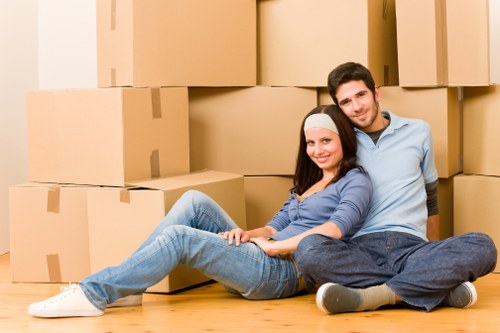 Packed moving boxes and furniture for a house removal