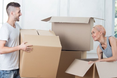 Packed household boxes and furniture prepared for transport and storage