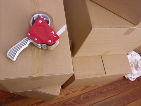 Packed boxes and furniture prepared for temporary storage in Highbury
