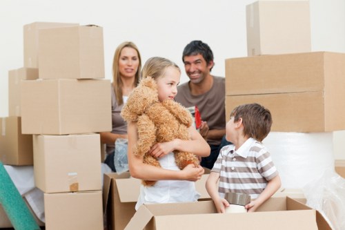 Boxes and furniture prepared for student storage in a Highbury home